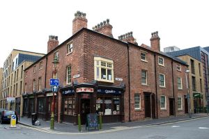 Birmingham back-to-backs, now preserved, showing the shop fronts and the entrance to the courtyard