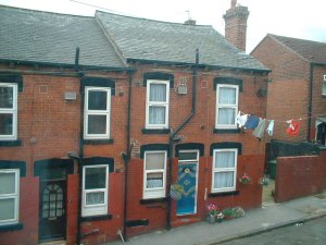 Typical across-street washing line arrangement with pulley operated from street level in Armley, Leeds, 2004 ~19th-century houses in West Yorkshire, 2004 in Leeds, Armley (Wikipedia)