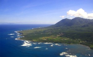 Nevis AerialCC BY-SA 2.5 Aaron Vos - Own work The east coast of Nevis, partially protected by coral reefs. Long Haul Bay is seen in the foreground. Aerial shot taken from the northeast, depicting the east coast of the island of Nevis, Saint James Windward Parish, Saint Kitts and Nevis, West Indies. Long Haul Bay in the foreground. The islands of Redonda and Montserrat are visible at the horizon.