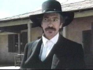 In 1990, Rickman played Elliott Marston in "Quigley Down Under."