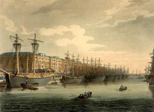 West India Docks by Augustus Pugin and Thomas Rowlandson (figures) from Rudolph Ackermann's Microcosm of London, or, London in Miniature (1808-11). Thomas Rowlandson (1756–1827) and Augustus Charles Pugin (1762–1832) (after) John Bluck (fl. 1791–1819), Joseph Constantine Stadler (fl. 1780–1812), Thomas Sutherland (1785–1838), J. Hill, and Harraden (aquatint engravers) - mechanical reproduction of 2D image West India Docks: This engraving was published as Plate 92 of Microcosm of London (1810) ~ Public Domain https://en.wikipedia.org /wiki/West_India_Docks