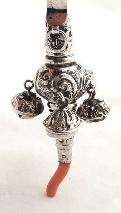 f653ca98af54bbd0ac216d0d734bdb1f--baby-rattle-coral